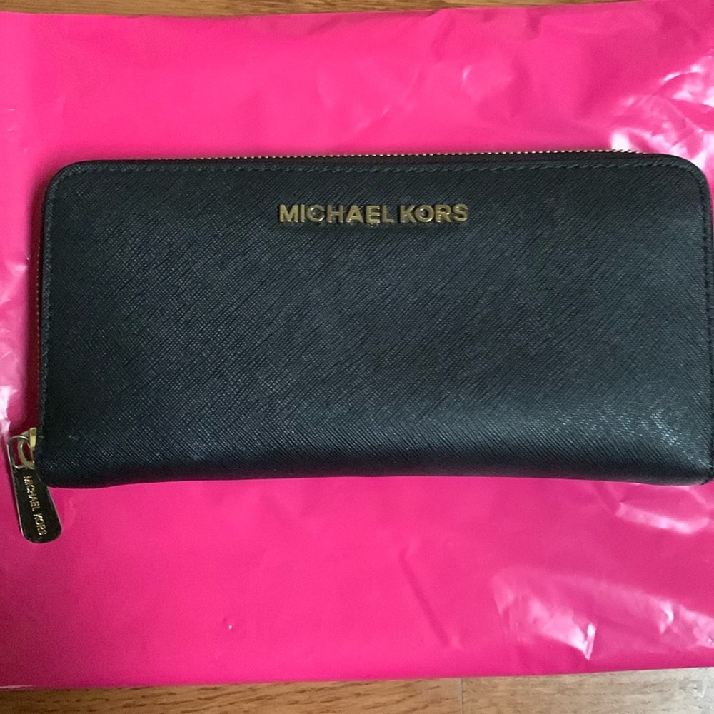 Micheal Kors Black with gold zip around wallet